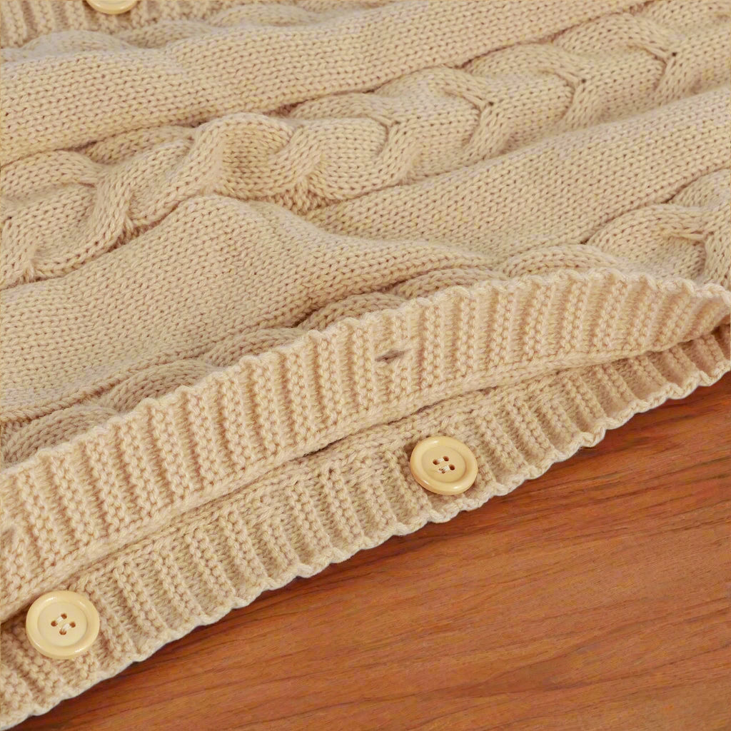 Nid d'ange bébé beige bouton bois