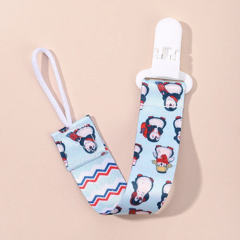 Attache tétine BeautyClip™ pingouins