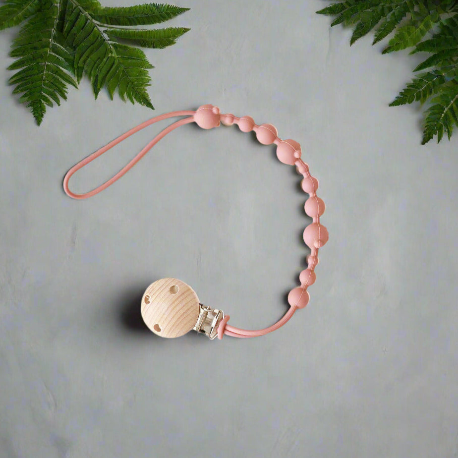 Attache tetine CalmingBear™ rose