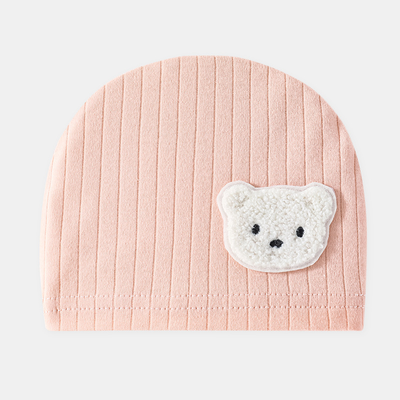 Un bonnet bebe rose.
