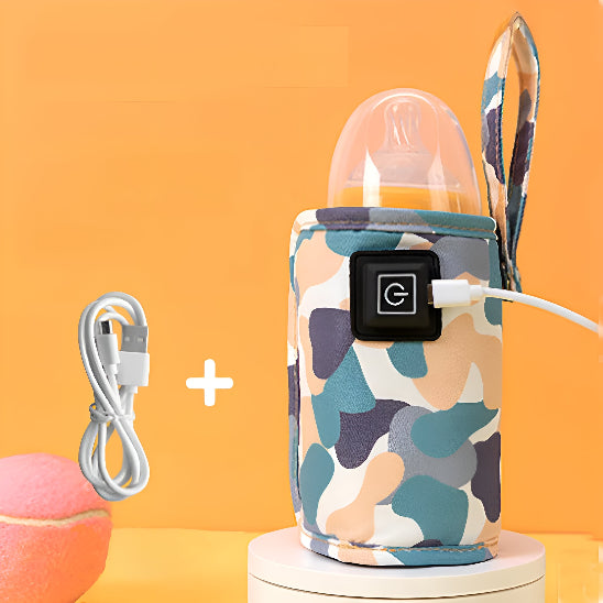 Un chauffe biberon portable avec un câble de charge sur une plate-forme blanche.