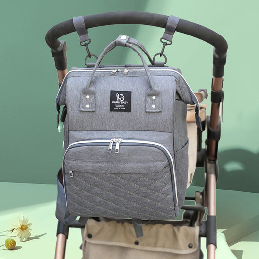 Sac à dos à langer gris poussette