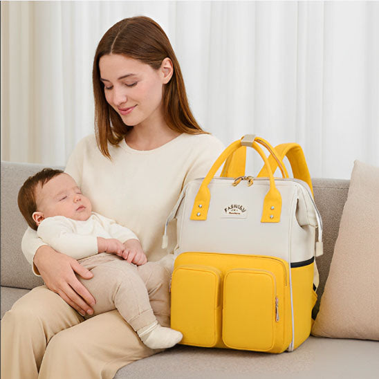 Sac a dos a langer FashionTravel jaune bébé maman divan