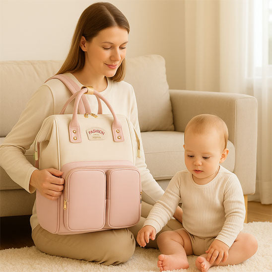 Sac a dos a langer FashionTravel  rose bébé maman salon